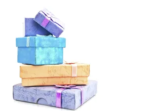 Gift Box Drucke: Multicolored Gift Boxes Stack With Bow Against White Background