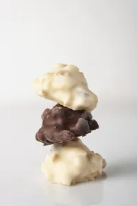 Bright Studio Photography Setup Drucke: A stack of chocolates, selective focus