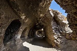 Middle East Religious Building Drucke: Cave system in the Takht-e Rostam stupa monastery complex