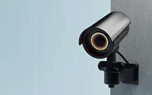 CCTV Security Camera Drucke: CCTV Security camera isolated on wall at blue background