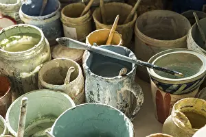 Ceramic Workshop Germany Drucke: Ceramic workshop, pots with paint and paintbrush