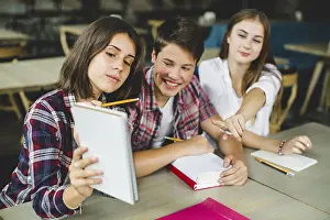Educational Institution Drucke: Cheerful students playing classroom