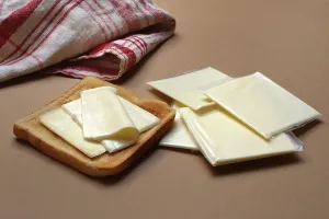 Cheese On Toast Drucke: Cheese slices with toast, processed cheese in packaging