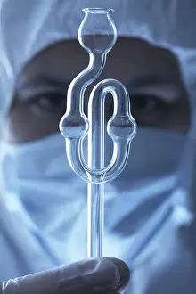 Face Mask Protection Drucke: Chemist holding brewing flask in direction of the camera