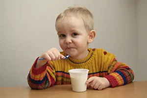 Healthy Dessert Options Drucke: Child eats yogurt