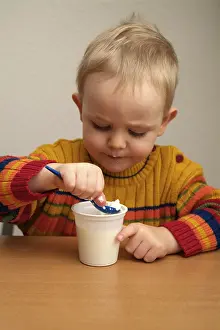 Healthy Dessert Options Drucke: Child eats yogurt