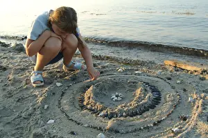 Beach Vacation Germany Drucke: Child plays at the beach