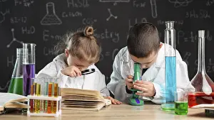 Science Education For Children Drucke: Children doing experiments laboratory