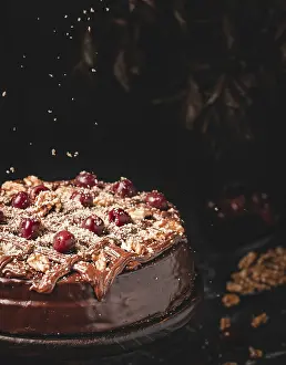 Baked Goods Studio Photography Drucke: Chocolate cake with nuts and cherries