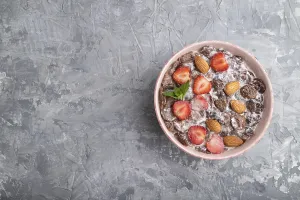 Pastel Orange Background Drucke: Chocolate cornflakes with milk