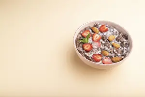 Pastel Orange Background Drucke: Chocolate cornflakes with milk