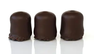 Rich Desserts Drucke: Three chocolate-covered marshmallows