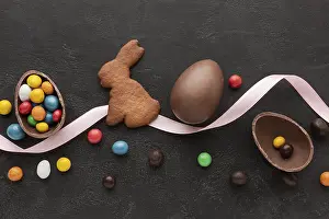 Decorative Easter Eggs Drucke: Chocolate egg easter bunny shaped cookie with candy