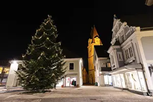 Church Tower At Night Drucke: Christmas tree on the main square