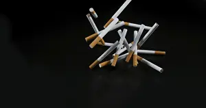 Addictive Drug Health Risks Drucke: Cigarettes Falling against Black Background