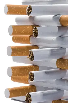 White Background Copy Space Drucke: Few cigarettes lying on a white background