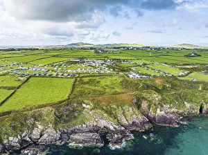 British Coastal Landscape Drucke: Cliffs over Caerfai Beach and Bay from a drone