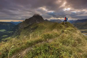 Nature Reserve Austria Drucke: Climber looking on the summit of the Widderstein