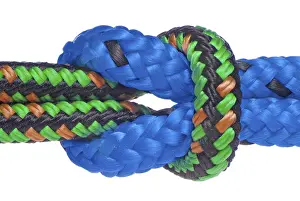 Teamwork Concept Image Drucke: Two climbing ropes are entwinded