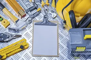Construction Tools Drucke: Clipboard with white sheet of paper and set construction tools