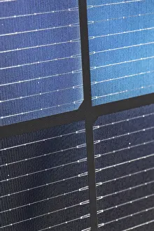 Close Up Detail Drucke: Close up of bifacial solar panel cells with blue grid pattern and black frame