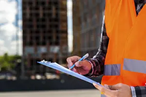 Close Up Construction Drucke: Close up construction engineer writing