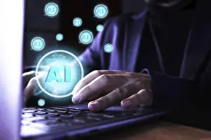 Artificial Intelligence Drucke: Close up of a man using a computer with artificial intelligence icons