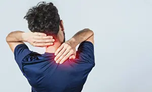 Joint Pain Relief Drucke: Close up of person with shoulder and neck problems