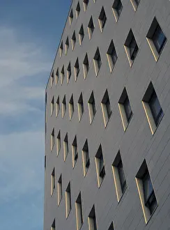 Contemporary Architecture Design Drucke: Close up perspective view of a modern apartment development with white stone cladding