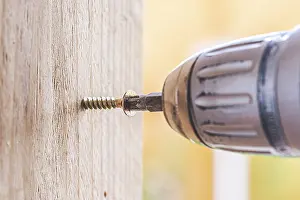 DIY Repair Tools Image Drucke: Close up of screw and screwing machine, workshop
