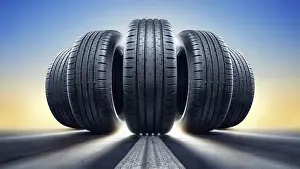 Warm Evening Sunlight Drucke: close up of five tires against a sunset