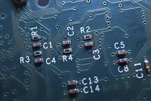 Electronic Technology Studio Shot Drucke: Close-up of blue lighted electronic computer circuit board with microchips and lines
