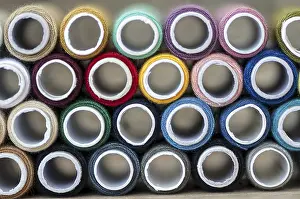 Handicraft Detail View Drucke: Close-up on colored sewing threads on spools