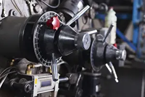 Industrial Equipment Drucke: Close-up details of typography machine and red button