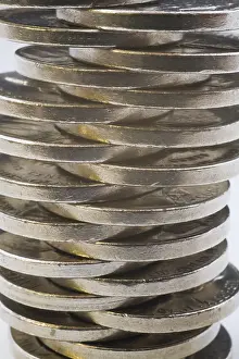 Empty White Space For Text Drucke: Close-up of evenly lopsided stack of US five cent coins on white background