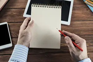 Scientist At Work Drucke: Close-up of hands with notepad. office work