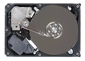 Electronic Technology Studio Shot Drucke: Close-up inside view of hard disk isolated on white background