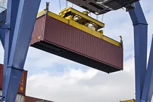Deserted Harbor Scene Drucke: Close-up of the loading of a shipping container