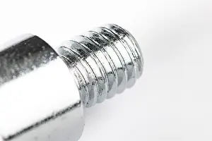 Bright Light Studio Shot Drucke: Close-up of a metal thread on a white background