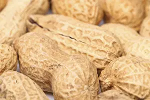 Legume Plant Drucke: Close-up of some peanuts. background of some peanuts