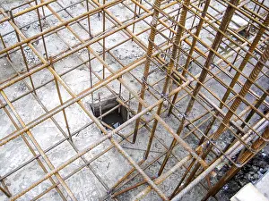 Deserted Construction Site Drucke: Close-up of a rebar structure lying on the ground