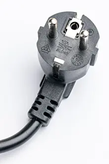 Studio Cutout Image Drucke: Close-up of a Schuko plug on a white background