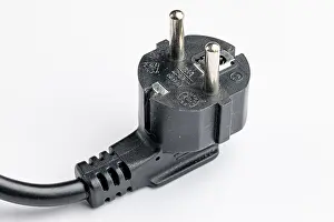 Isolated On White Ground Photo Drucke: Close-up of a Schuko plug on a white background