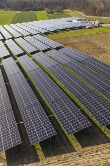German Solar Panel Installation Drucke: Close-up of structured solar modules over green fields