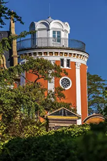 Abandoned Water Tower Germany Drucke: Close-up of the upper part of the red observation tower with windows and clock