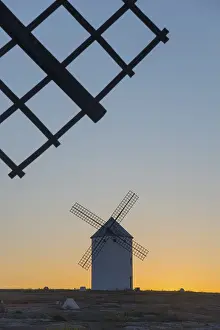 Evening Sun In Spain Drucke: Close-up of a windmill at sunset with another one in the background