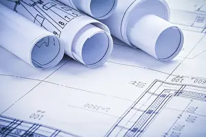 Rolled Blueprints Drucke: Very close up view on rolled blueprints