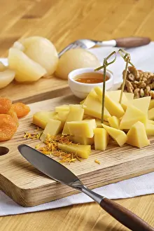Cheese And Fruit Arrangement Drucke: Close up view of set of various appetizers for wine