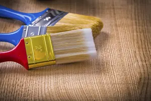 Studio Shot Of Paintbrushes Drucke: Very close up view on stack of three paint brushes