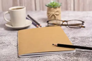 Coffee And Books Drucke: Closed notebook with brown covers